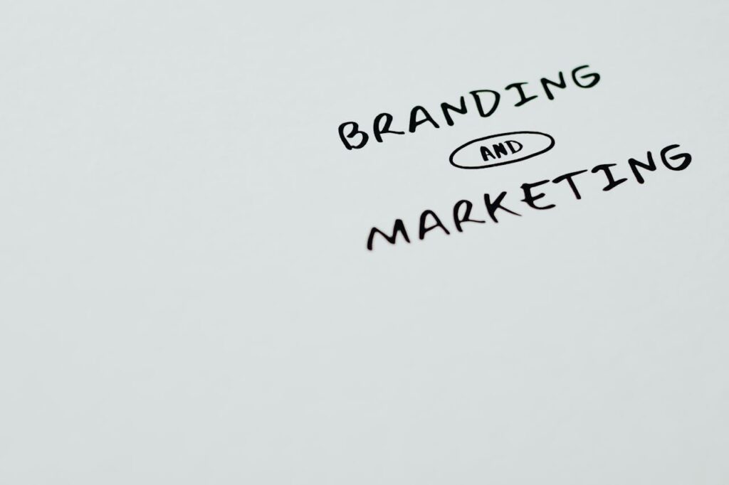 A minimalist image featuring the words 'Branding' and 'Marketing' on a white background, ideal for digital marketing themes.